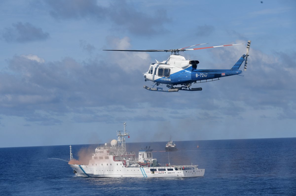 ChinaDaily's tweet photo. A comprehensive maritime emergency rescue drill of Sansha city is conducted in the waters near Yongxing Island of the Xisha Islands, South #China's #Hainan province, June 26, 2025. #SouthChinaSea https://t.co/ArBsTp7dlB https://t.co/FeLJ88kxrq