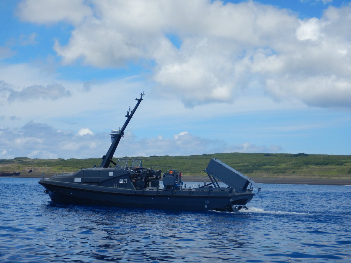 The very interesting USV serving the Japan Maritime Self-Defense Force, which can be carried by the Mogami class frigate in its stern dock, seen here undertaking mine countermeasures role.