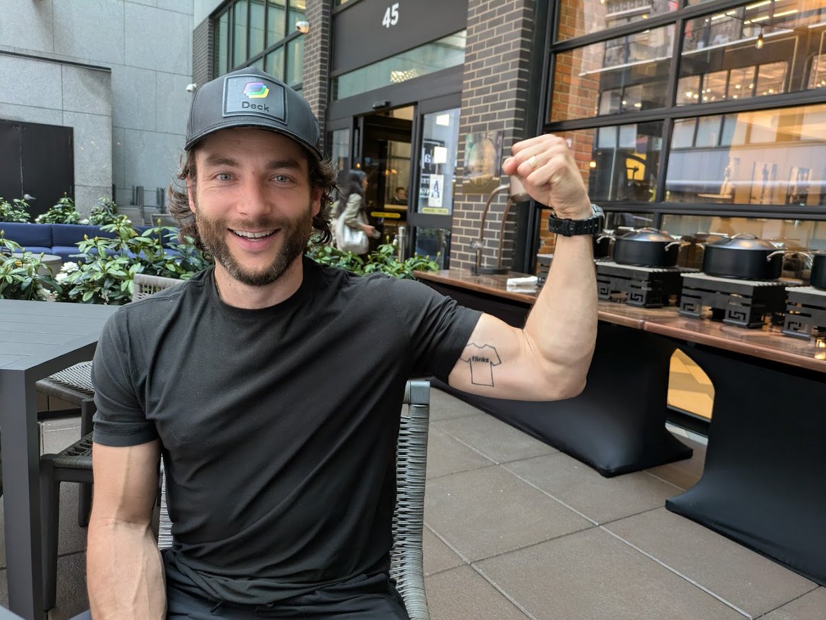 TedMerz's tweet image. The View from the Office.
I met up with Frédérick Lavoie, co-founder of Deck. We each grabbed a coffee and sat under an awning at the Archer Hotel on 38th street.
I persuaded him to flex so I could see the “Flinks” tattoo on his arm which he and his co-founder got after…