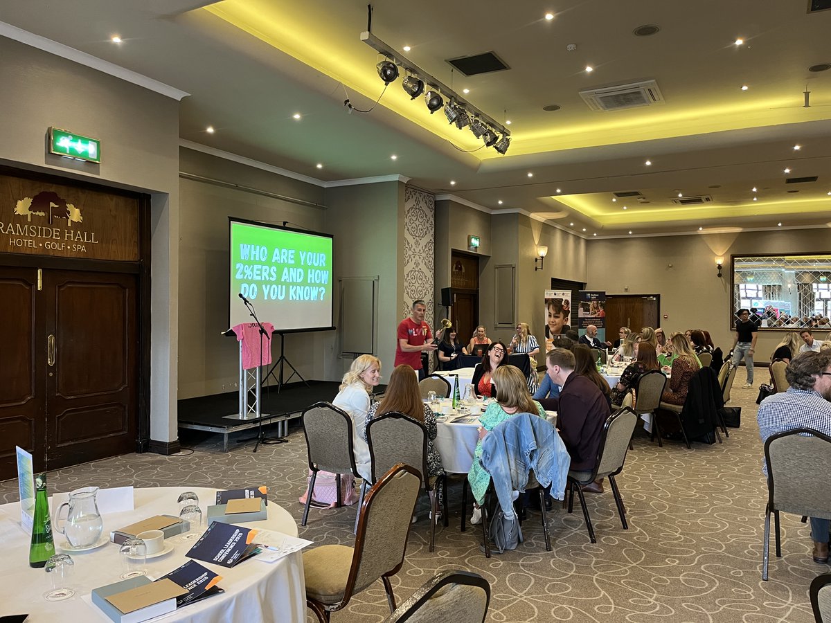 Our first speaker of the day is Dr Andy Cope, Best Selling Author of the his book ‘The Art of Being Brilliant’.

Andy is a keynote speaker, best-selling author and ‘recovering academic’. As the UK’s first ever Dr of Happiness, he is also a regular on TV, radio and podcasts.