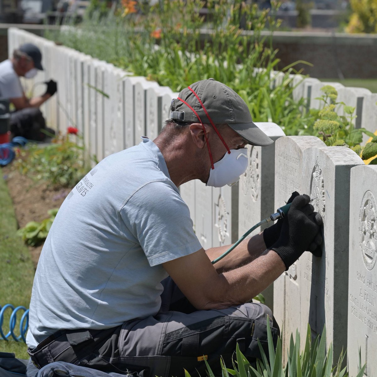 CWGC's tweet image. Our colleagues at work 📍 Bailleul Communal cemetery extension in France.