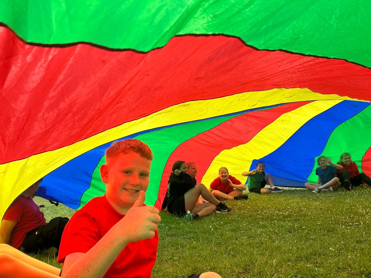 StMattsAcademy's tweet photo. As the year 6's time at Primary school starts to come to an end, it was time to reflect on some of our favourite memories in PE. We pulled out the parachute yesterday and played some of games we were taught when we first arrived at St. Matthews. #Memories #TeamStMatts https://t.co/JAdUQ7nbHH