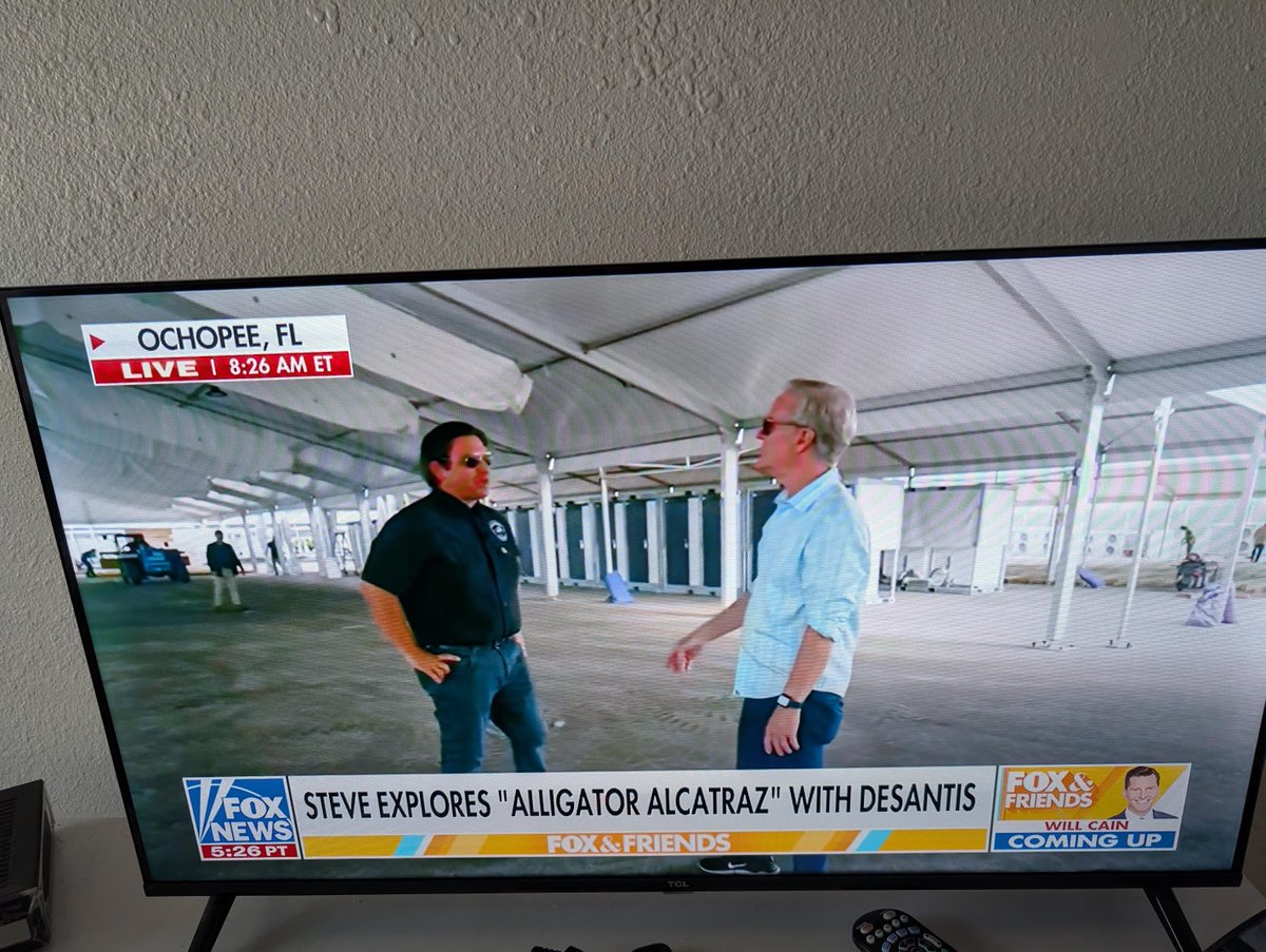 .<a href="/GovRonDeSantis/">Ron DeSantis</a> on the ground at "Alligator Alcatraz" site with <a href="/FoxNews/">Fox News</a> - he says the facility will be able to take in detained migrants by next Tuesday.