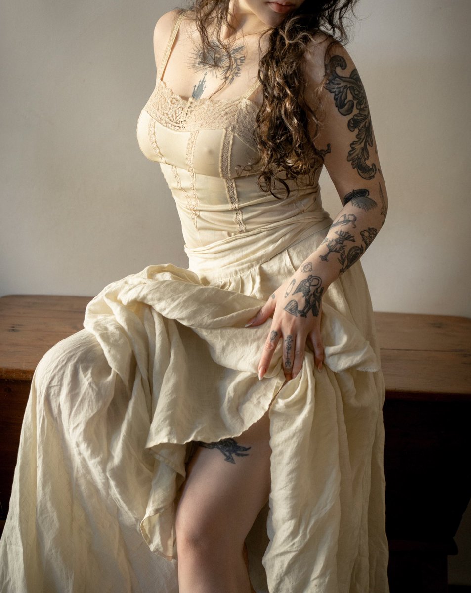 clothed in white samite, mystic, wonderful