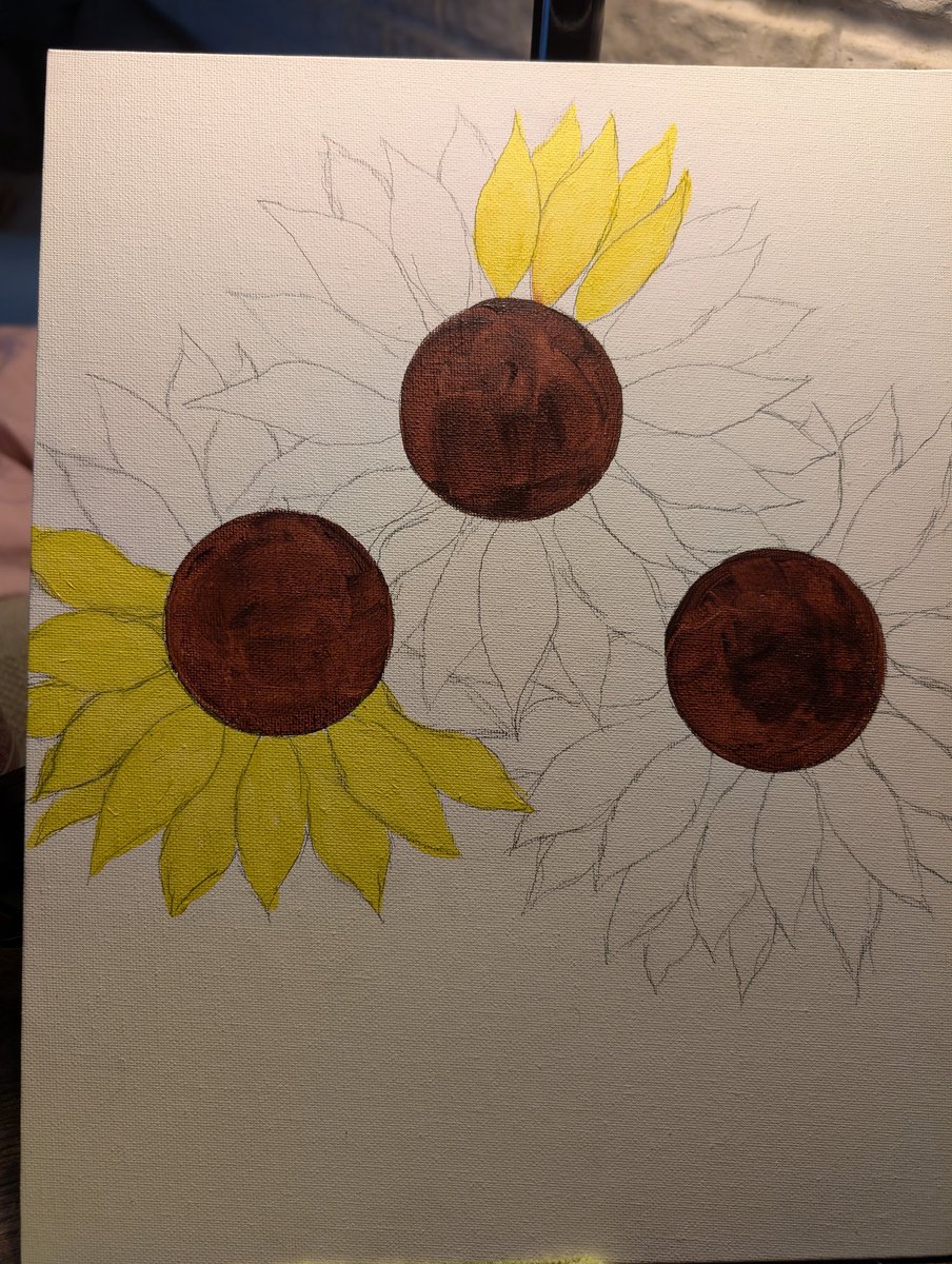 Decided to start a new painting...now to see how almost real I can make some sunflowers look.