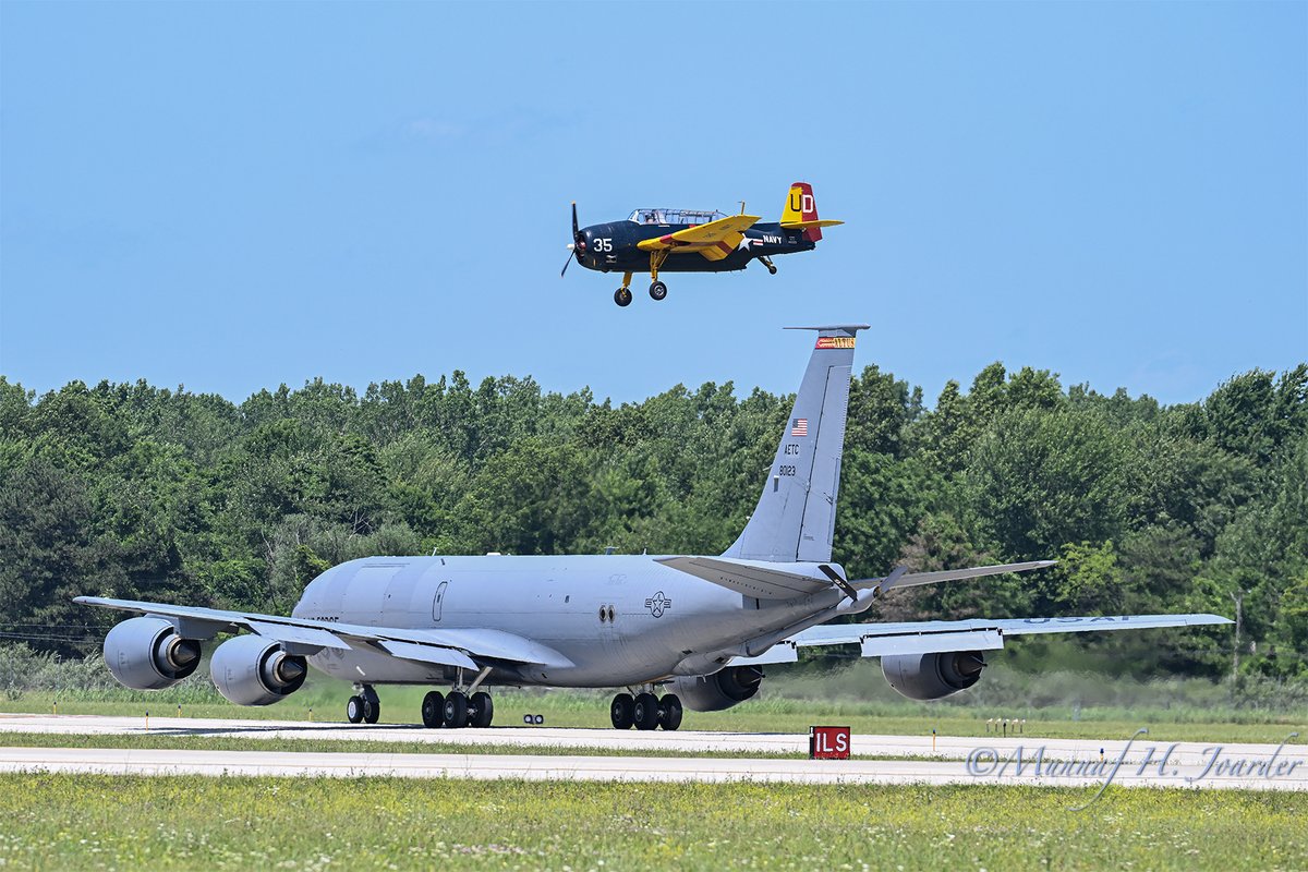USAF KC-135R holds short while an Avenger lands after a flight demonstration at Thundr Over Michigan 2025.