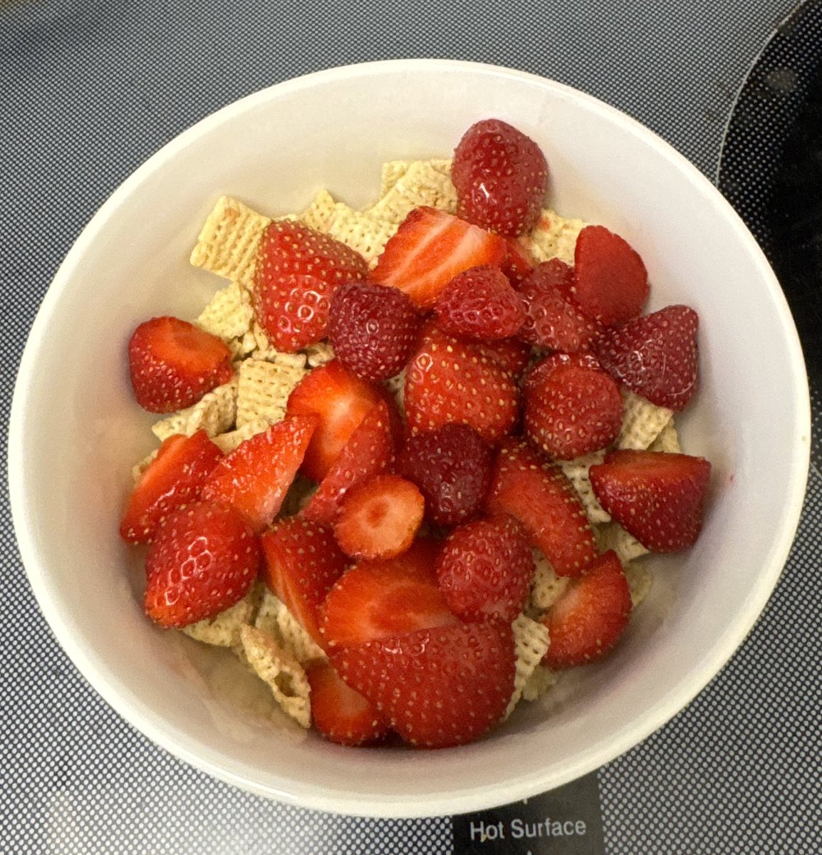 drrogera's tweet image. Breakfast of cereal and strawberries from my garden