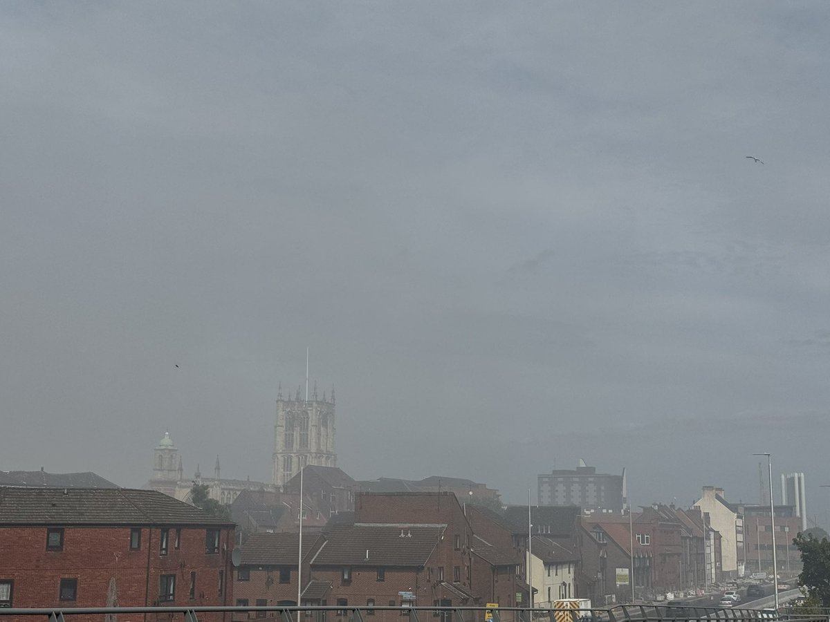 jameshoggarth's tweet photo. The smoke hanging over #Hull from the cargo ship fire. A strong distinctive smell too https://t.co/sZFIFkaNjo