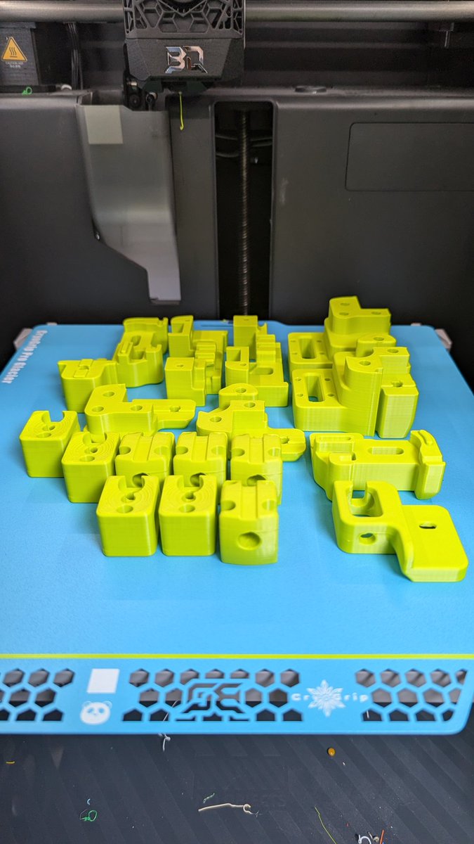 Another batch of voron 2.4 parts fresh off the printer. One thing I have found I really like with ABS is after cooling it just slides off the build plate