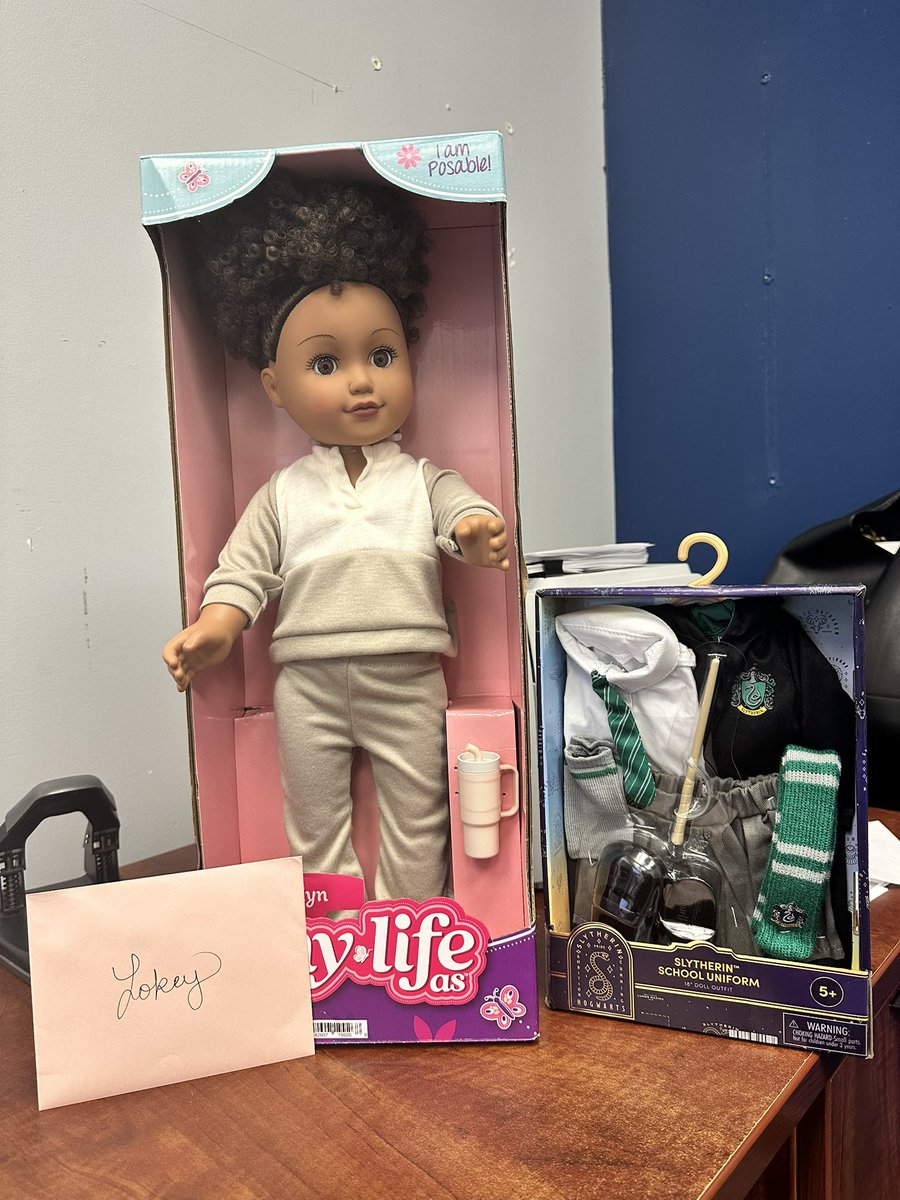 CounselorLokey's tweet photo. Just got the sweetest birthday gift from a former coworker — a Slytherin doll! 💚 As a boy mom, I never really get to play with dolls, so I’m extra excited to put her on display in my new office at Randle High School. #HarryPotter #SlytherinPride #CounselorLife 🐍🎁 https://t.co/BfyaolG5x8