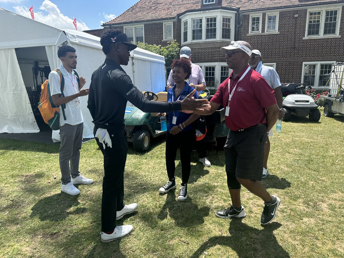 Detroiter Joe Hooks gets some love from Mom and Dad after his PGA Tour debut comes to an end.