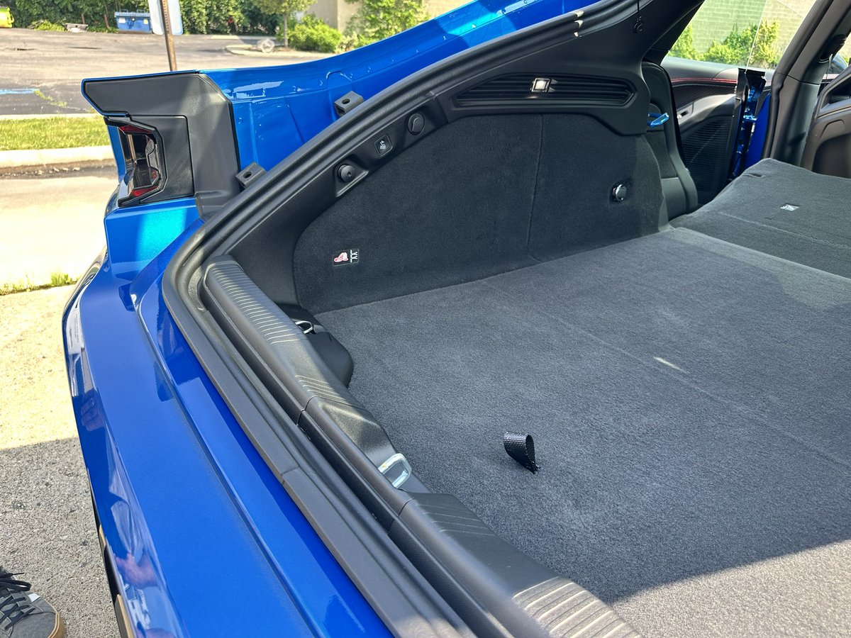 Autoline's tweet image. There’s an app that helps first responders find the “cable cut” spots on EVS in case of an accident. But to help them find it faster, #Dodge added these fireman’s hat icons in the trunk and under the hood of the Charger EV. Such a simple but effective visual aid.
