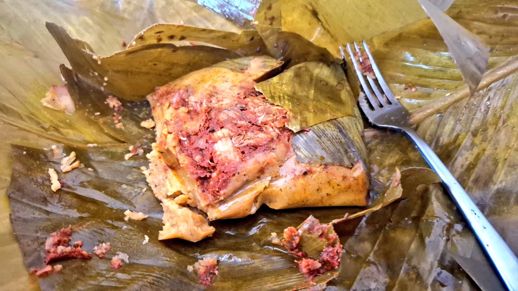 Enjoying a delicious #Panamanian tamal de olla.

Made with corn dough, chicken and spices, wrapped in banana leaves.
#Panama #Foodie #Tamal