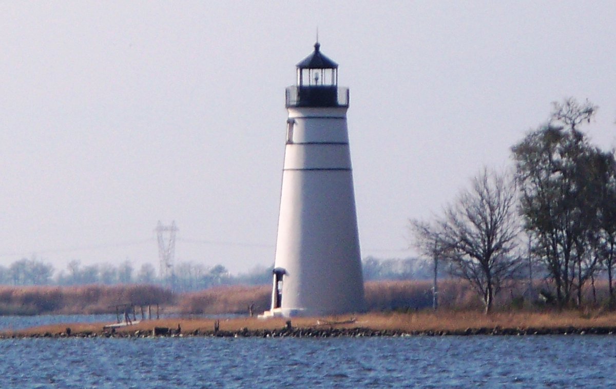 FRIDAY FROM THE ARCHIVES | TCHEFUNCTE RIVER RANGE REAR LIGHT

Built in 1838, the Light Station marks the entrance from Lake Pontchartrain. The 38-foot brick tower uses materials from the Civil War-damaged original &amp; a lantern from Mississippi's destroyed Cat Island Light.