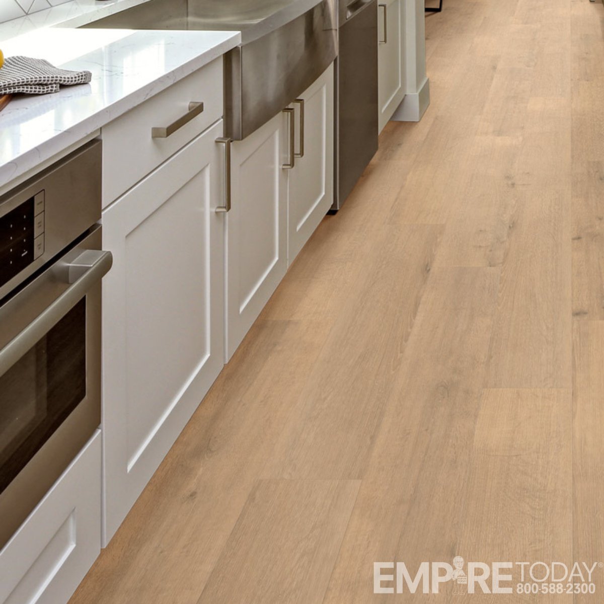 Hardwood looks, worry-free living. Engleton vinyl stands up to kitchen messes without missing a beat.

empire.today/45wAc7h