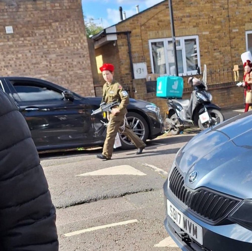 Jewish kid cosplaying as an IDF "soldier" in broad daylight, near a mosque in Stamford Hill, north London; this is the community whose feelings are "constantly hurt" when the holocaust in colonised Palestine is brought up.