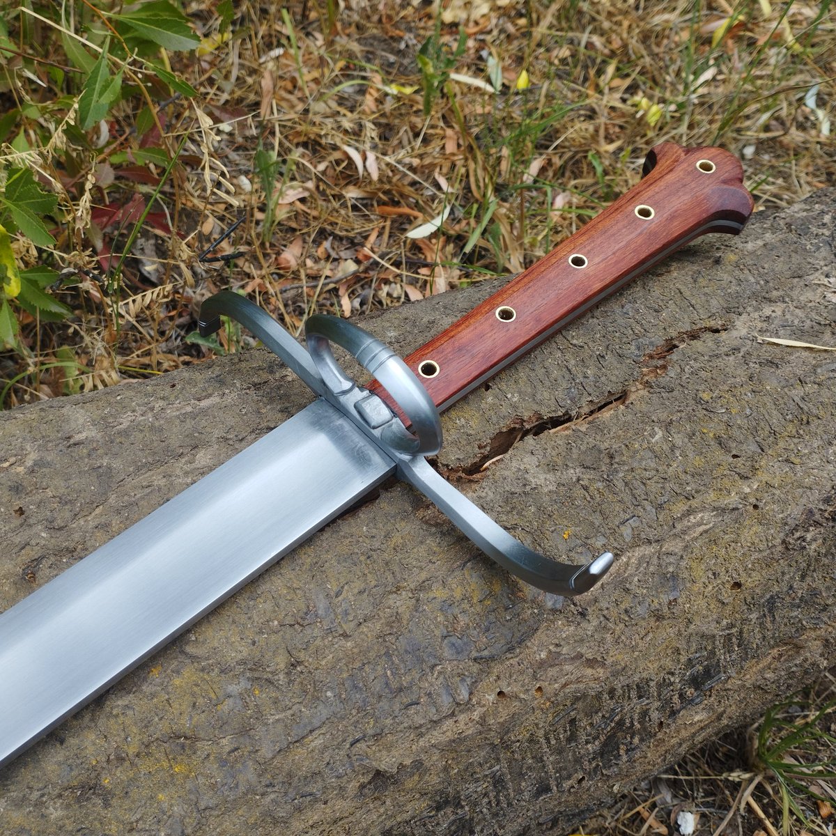 Custom Kriegsmesser with bubinga scales done. Blade shape and proportions based on Dürer's Martyrdom of St Catherine, grip shape based on woodcuts by Dürer&amp;Beham. 1100oal, 885 blade length, 1115g@155mm, reinforced tip, tapered and fullered tang.