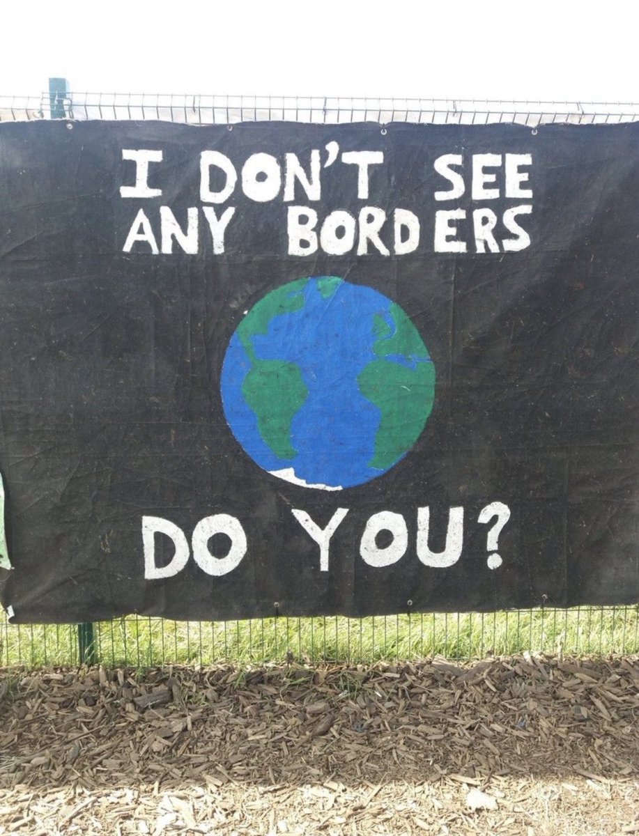 They passed through a 13ft Glastonbury fence to pin up this flag without any sense of irony whatsoever.