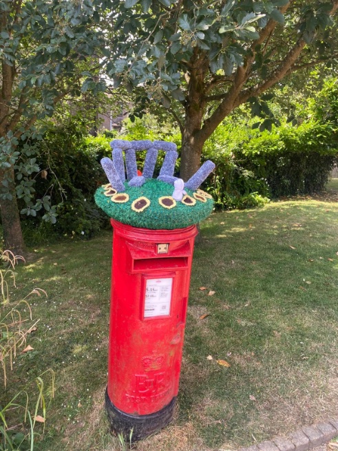 Next-level knitwear in Battle: Stonehenge complete with druid.