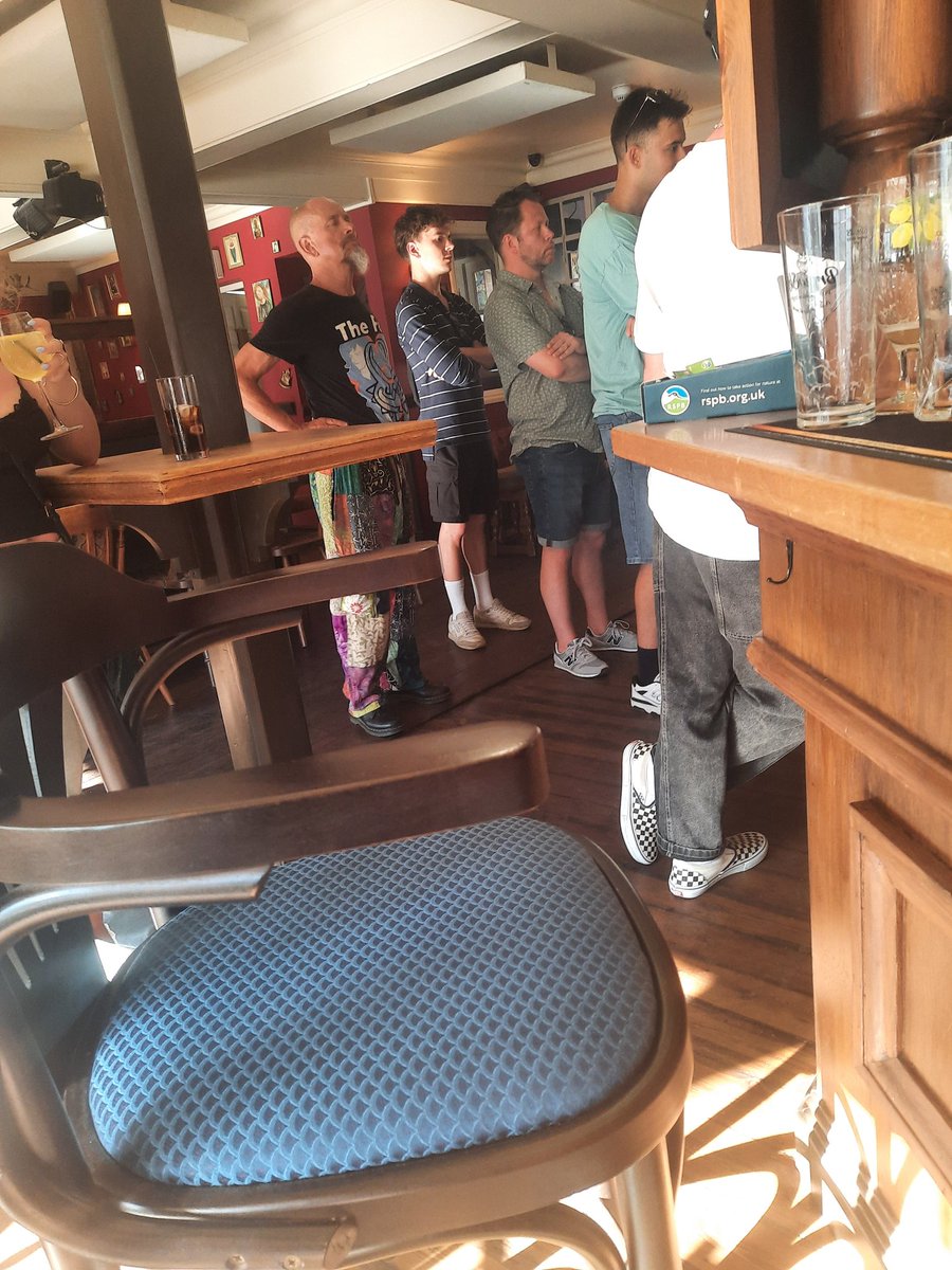 Just why? Plenty of bar space in a traditional boozer and these bozos insist on queuing.  🤬