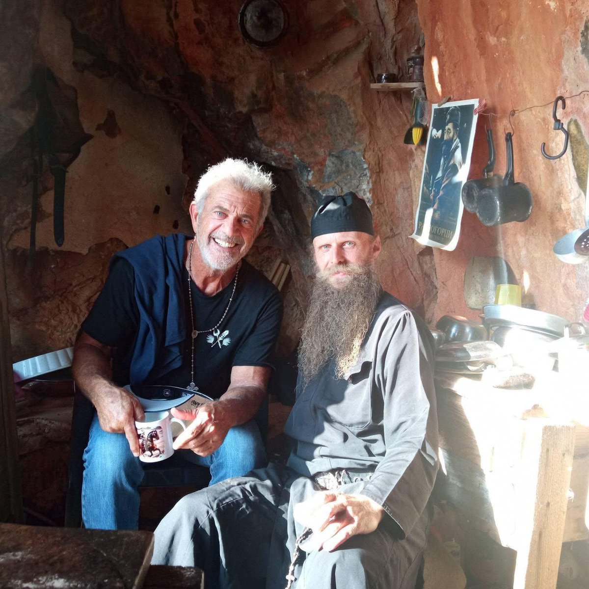 CHECK THIS OUT: Mel Gibson at Mount Athos posing with a Serbian Orthodox monk.

On the right you can see a portrait of a legendary Serbian anti-fascist and anti-communist General Draža Mihailović.