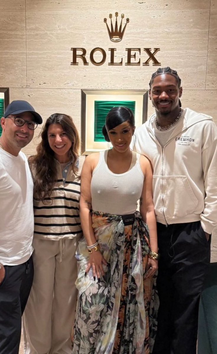TheHottestDrop's tweet image. Cardi B with Stefon Diggs at Rolex. 📸