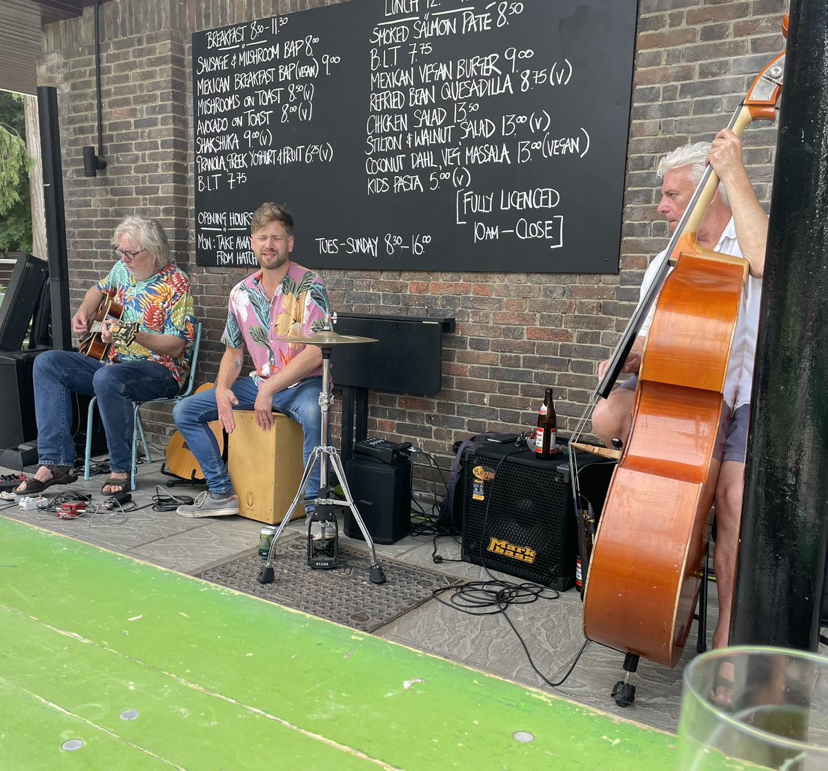 Latino and gypsy jazz vibes with Los Twangeros over the road on the terrace at the Pump House.