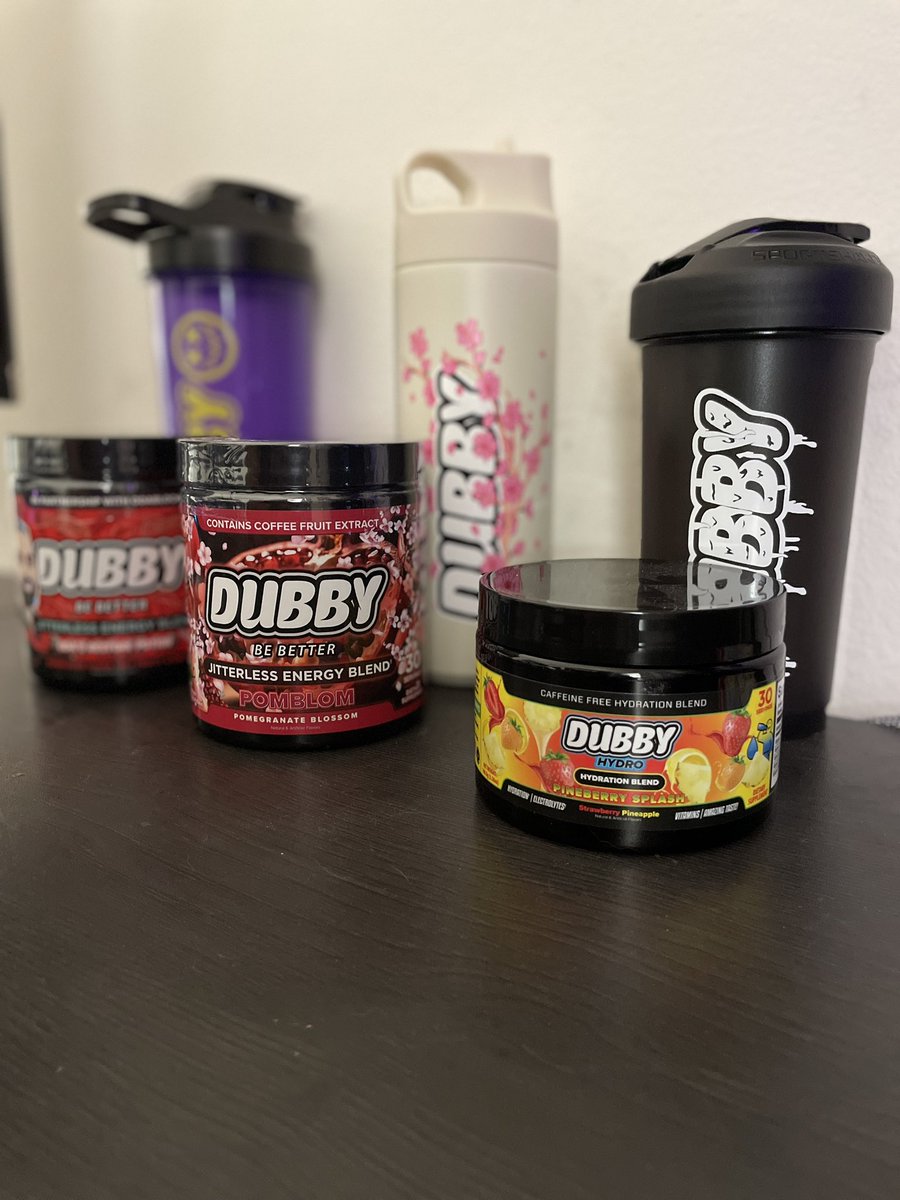 _Tactigirl's tweet photo. Opened my #dubbyenergy delivery  📦 

So excited to finally try the pomegranate blossom! The hydration blend pineberry slash is perfect for this hot weather! Try them out and use code: TACTIGIRL  Also thanks @DubbyEnergy for the new shaker added to my collection. https://t.co/OQe6bYIT8c
