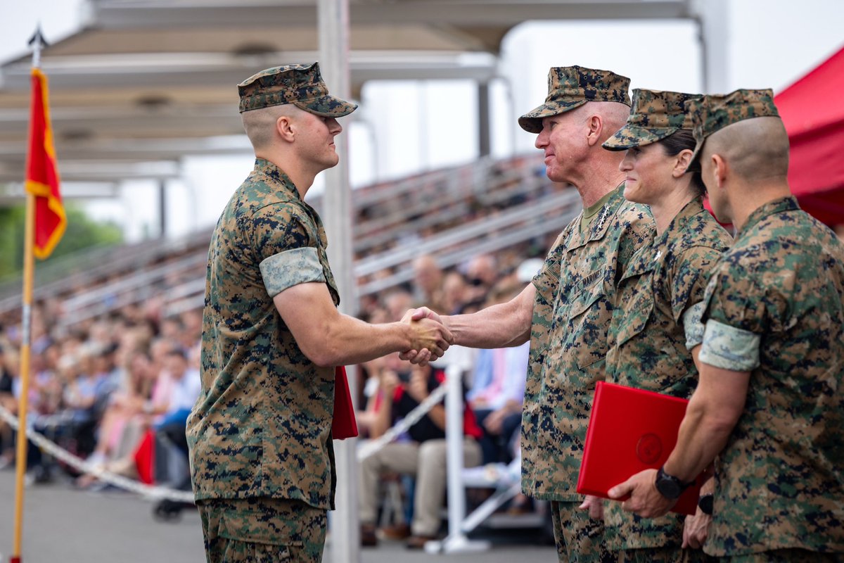 CMC_MarineCorps's tweet image. Today, I had the honor of serving as the reviewing officer for Lima Company’s graduation from Officer Candidates School. Since 1919, we have trained those who aspire to lead as Marine Officers in the foothills of @MCB_Quantico, under one standard—the Marine Corps standard.