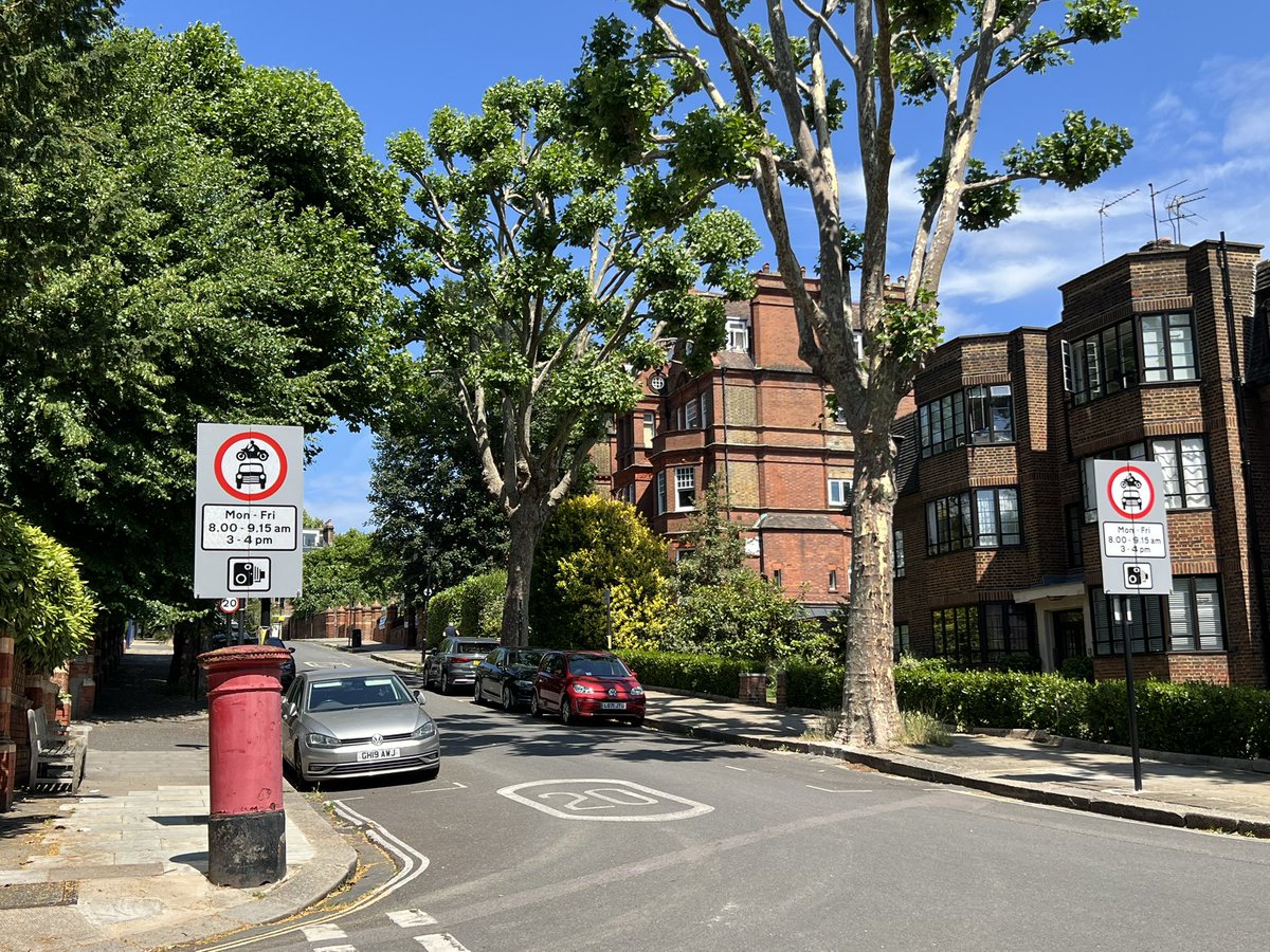 London school streets are less impressive than their Parisian counterparts. This is a timed, signed, and photo-enforced closure with no physical improvement to the roadway.