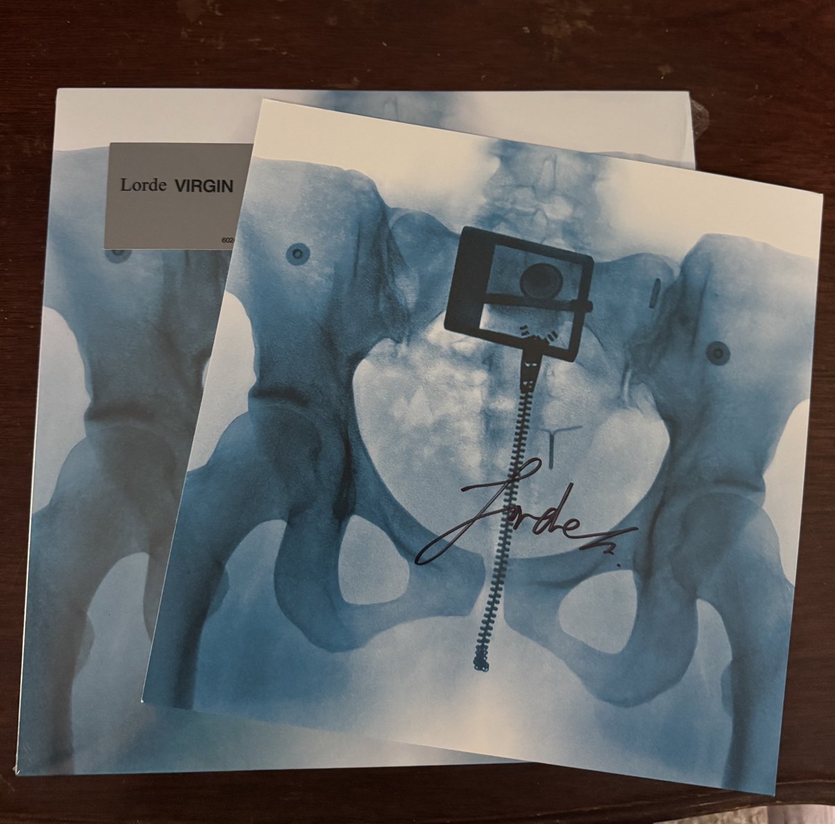 very dope signature for #VIRGIN. honored to own an album signed by <a href="/lorde/">Lorde</a> herself. 🫡😮‍💨