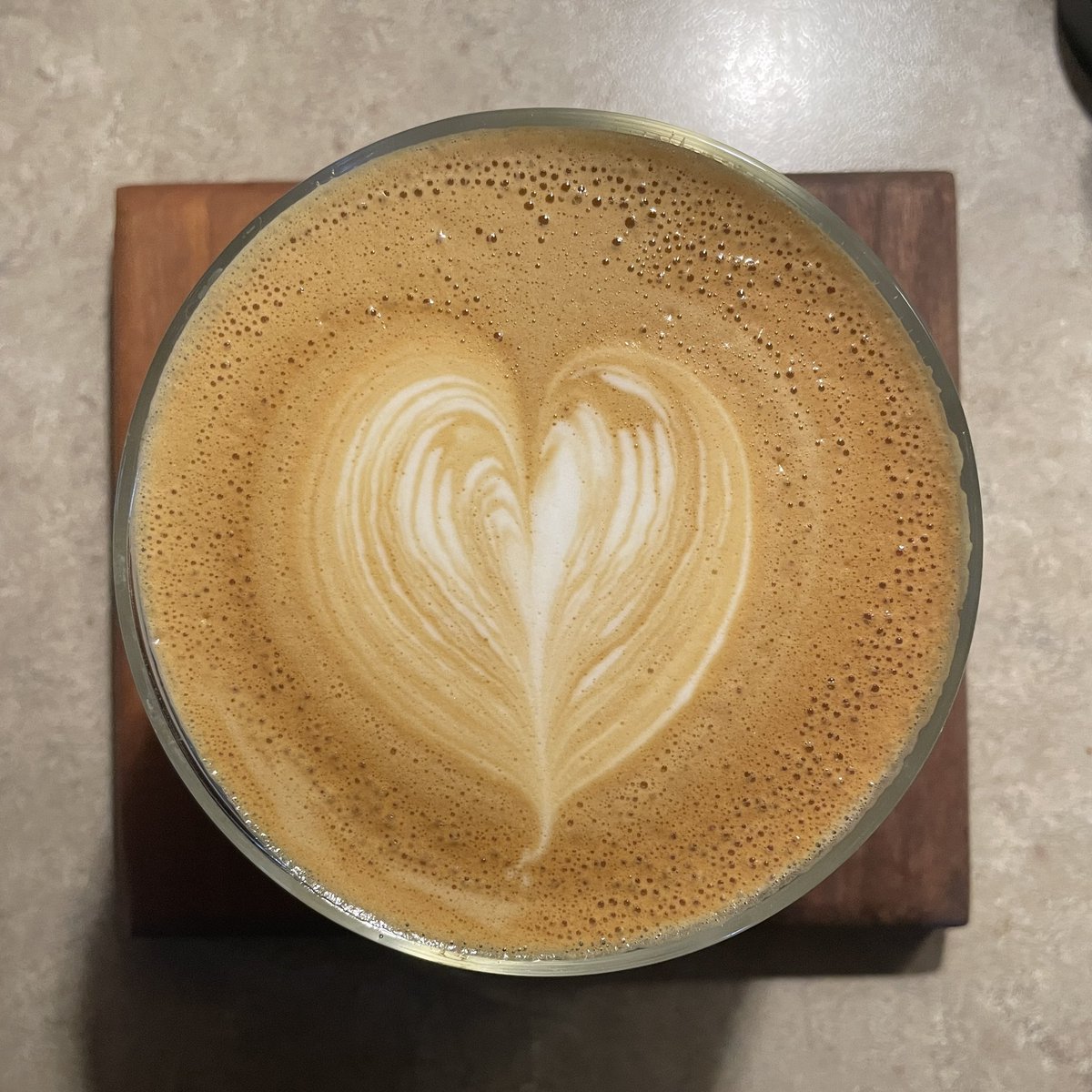 Latte 34:

For this one I ended up letting it sit a little longer than I should’ve while getting ready to take a picture, and I also let it steam a little longer than usual too which also made more bubbles appear. Still getting used to using my bigger milk pitcher