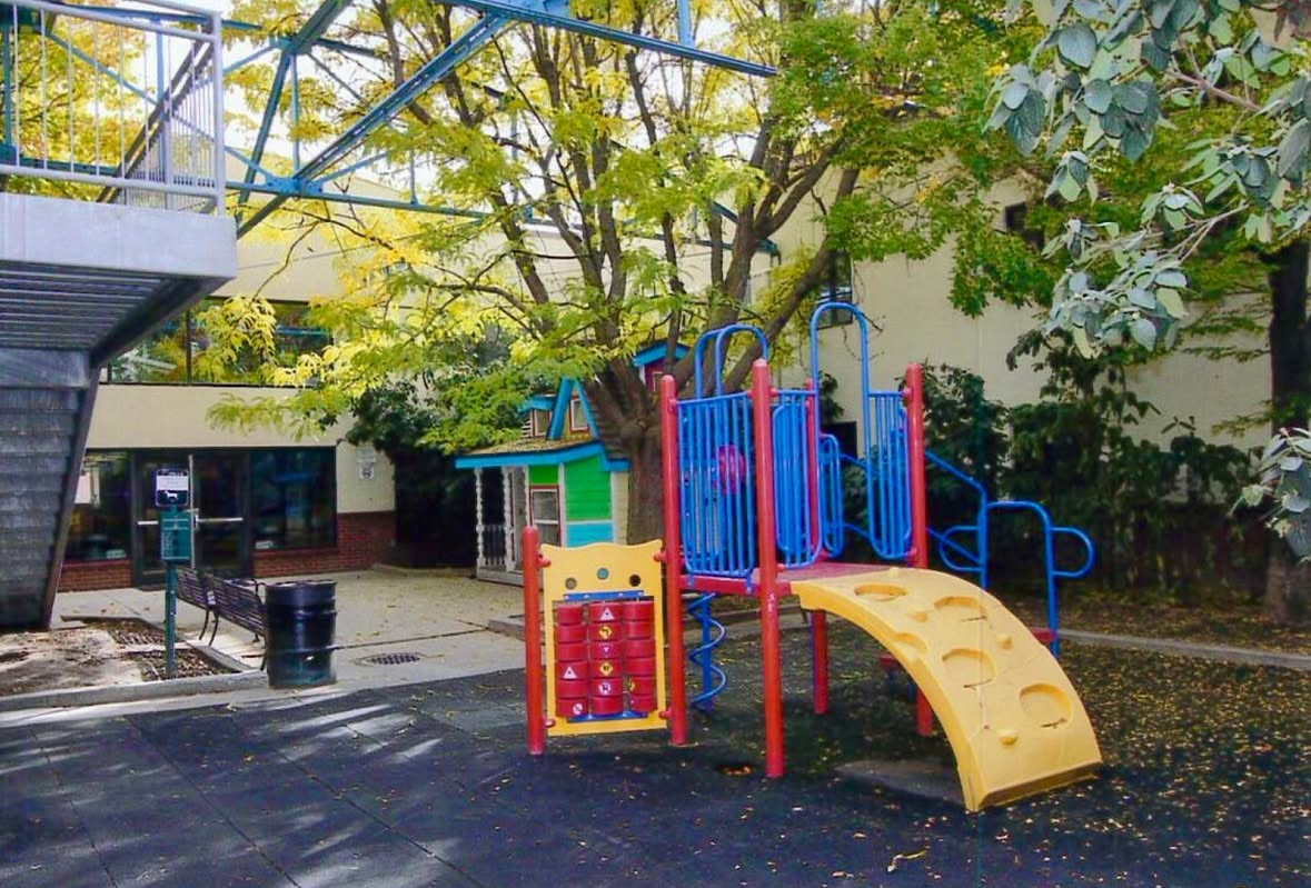 The Downtown Salt Lake Community Shelter was established in 1988 serving families, and adult men and women. One of our favorite spaces at that facility was the courtyard that had a playground and a playhouse where the children were able to enjoy themselves!