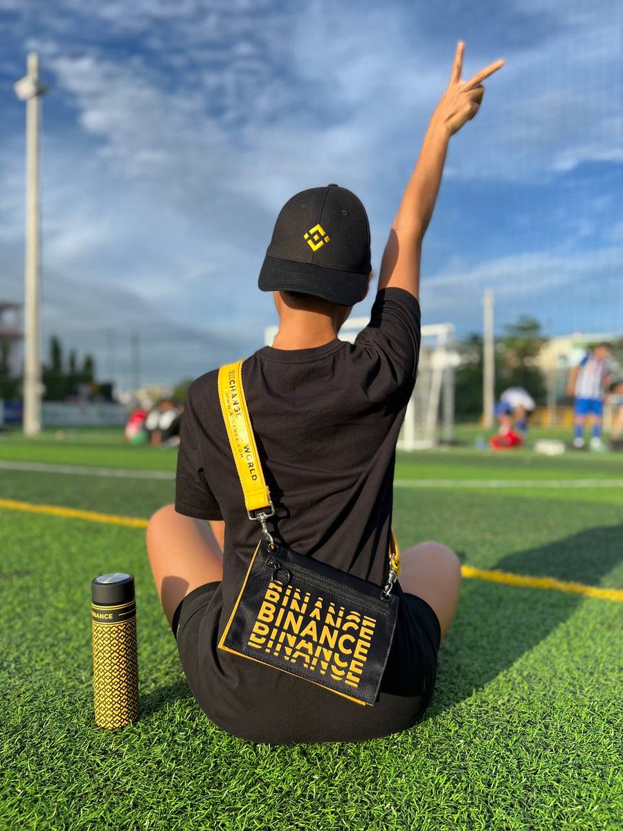 Just here, chilling with my Binance swag and vitamin D.