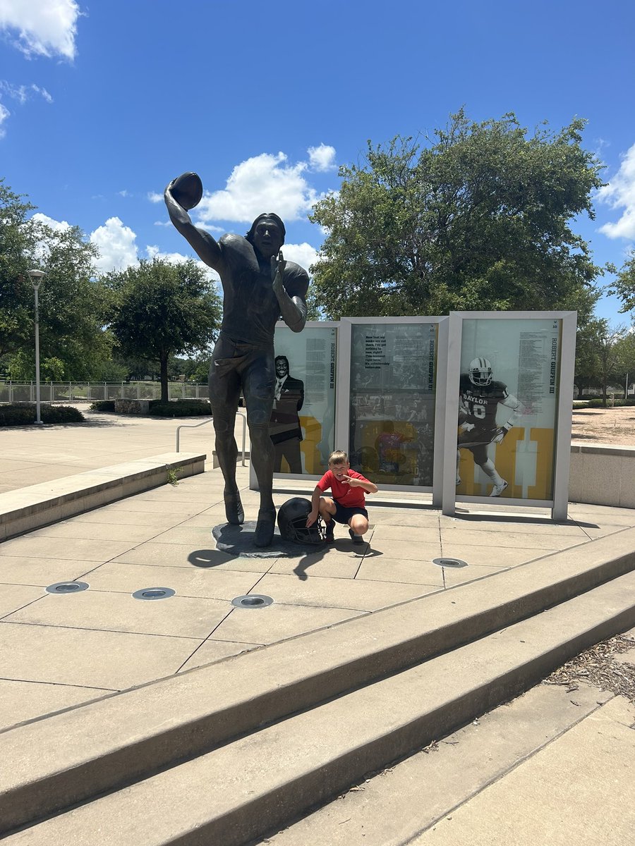 My RG II posing beside <a href="/RGIII/">Robert Griffin III</a>’s statue. Baylor has a beautiful campus and Football Facility. #SicEm