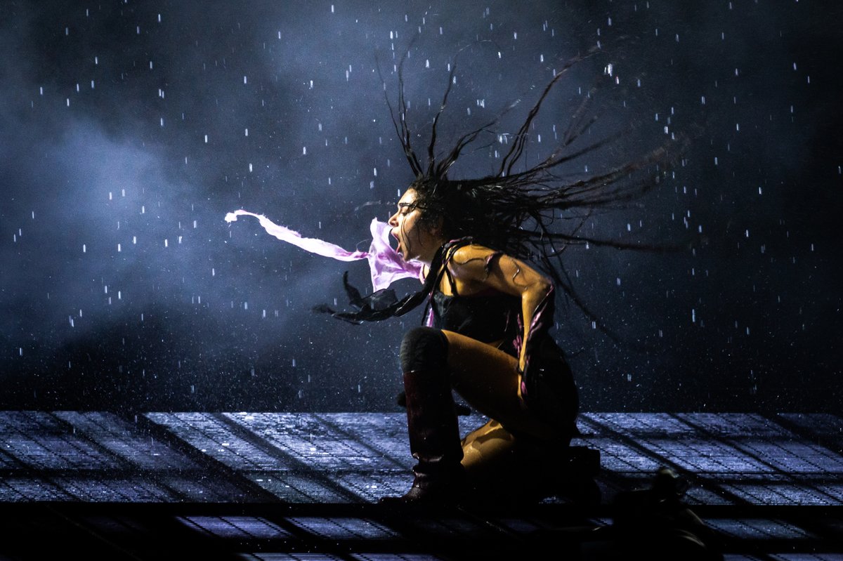 Charli xcx wears a custom draped skull scarf top in black McQueen skull-printed silk chiffon and georgette, belted shorts in black leather and McQueen skull scarves in burgundy and lilac silk chiffon.  

Headlining the Other Stage at #GlastonburyFestival 2025.