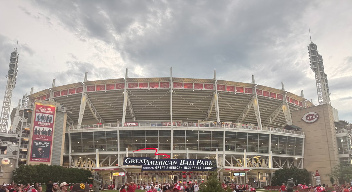aigkenham's tweet photo. On Saturday evening, Mally and I went to the Reds Stadium for one of the games between the Cincinnati Reds and the San Diego Padres. The Reds lost that one!

As we were walking to the stadium we came across some (well meaning I'm sure) people holding up banners such as 'Obey Jesus Or Hell," and preaching (basically yelling) into a microphone  telling people if they didn't trust Jesus they were going to Hell.

I don't question their motivation or burden to reach people with the gospel message, but I do question their methods, particularly in a post-Christian culture where increasingly generations just don't understand Christian jargon and don't know who Jesus is or what the bible is.  We have generations today who have been taught against the bible and anything Christian.

Now, don't get me wrong.  There is a place for open-air preaching, but this must be done in a way that really does engage people so one can present the message with gentleness and respect as God's Word commands us to be.

One of the most successful open-air evangelists is Ray Comfort @RayComfort along with his team at Living Waters @LivingWatersPub .  We @AiG love Living Waters and work together in various ways over the years. Ray is a personal friend of mine.

I asked Ray to sum up how he does open-air ministry.  He sent me this:

"Most people think of open-air preaching as someone yelling at passersby who don’t want to hear the gospel. But I’ve been preaching open air for more than 50 years, and I’m a strong believer in engaging a crowd rather than shouting at them. That’s why, for many years, I’ve used trivia to draw people in. 

"I stand up on a box (because I’m short) and announce, “I’m asking trivia questions. Here’s the first one: What’s the capital of France?” I deliberately make the questions easy so that people win a dollar.

"As a crowd begins to gather, I’ll ask someone, “What’s your name?” A guy in the crowd says, “Fred.” I reply, “That’s right! Here’s your dollar.” That makes people laugh and creates goodwill. All the while, I’m watching for someone who’s answering questions confidently.

"When I spot him, I say, “Jump up on the heckler’s box, and if you’re a good person, I’ll give you five dollars. I’ll even give you five dollars if you’re not.” So he climbs up, and away we go—through the Ten Commandments and into the gospel.

"The Apostle Paul said, “by all means save some.” This is one of the means I use, and it’s remarkably effective in getting people to stop and listen to the glorious gospel."

Of course Ray and his team do many other things too and have produced a phenomenal number of videos that have had many millions of views on YouTube.  And so many have trusted Christ for salvation through the ministry of Living Waters.

I noticed on Saturday that those screaming through the microphone outside the Reds Stadium about people going to hell, didn't seem to be impacting people positively--I heard many making negative comments and making derogatory gestures at them.

I'm not an open-air preacher--I'm not called to that but Ray Comfort is.  But for me, if we were going to be trying to witness to those coming to the Red's game I think i would be handing out some evangelistic apologetics booklets to reach people where they are at and engaging them in conversation if that opportunity arose.  Also this year we are sponsoring Faith Day at the Reds Stadium, and will be handing out all sorts of resources to people to impact them.

Oh, we did promote the Ark Encounter attraction at the Red's game Saturday as you can see from one of the photos.  Incidentally, 30% non-Christians come to the Ark @ArkEncounter and our research indicates 70,000 people a year minimum trust Christ for salvation as a result of God using this attraction.  Another 25,000 people a year trust Christ after coming to the @CreationMuseum.

I am just challenging people to understand where our culture is at and use wise methods in accord with biblical principles, to reach the lost with the most vital message in the universe, the saving gospel.