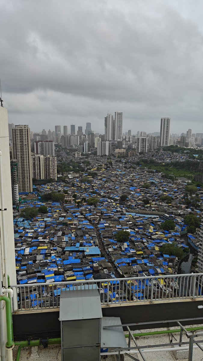 DeepakT282's tweet photo. View from Kandivali E Lokhandwala. How easy it was for these encroachers to get a land in a city like mumbai,Where we people have to give up our dreams to get a 1bhk flat in this city. Politicians have really ruined this city. @BhatkhalkarA @CMOMaharashtra @PMOIndia @PiyushGoyal https://t.co/BGidv9Rtbo