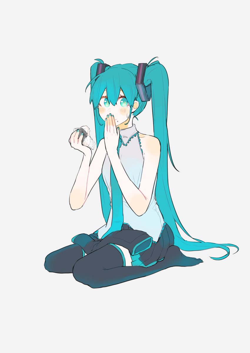 こそこそおにぎりを食べる初音ミクさん