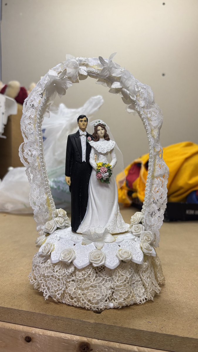 Found my cake topper from 1995. I hand painted the couple so they’d match us better 🤣 geez. I think the lace is leftover from my dress.