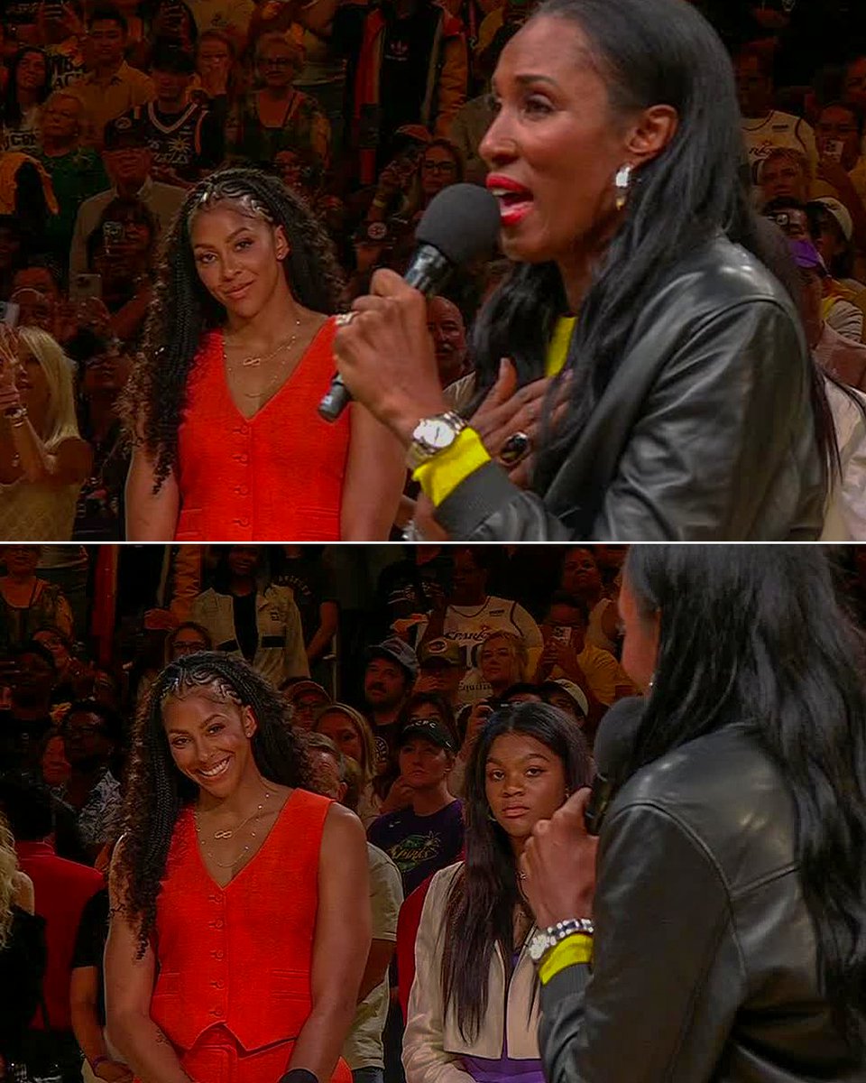 Candace Parker watches as fellow Sparks legend Lisa Leslie honors her during her jersey retirement day 💜💛