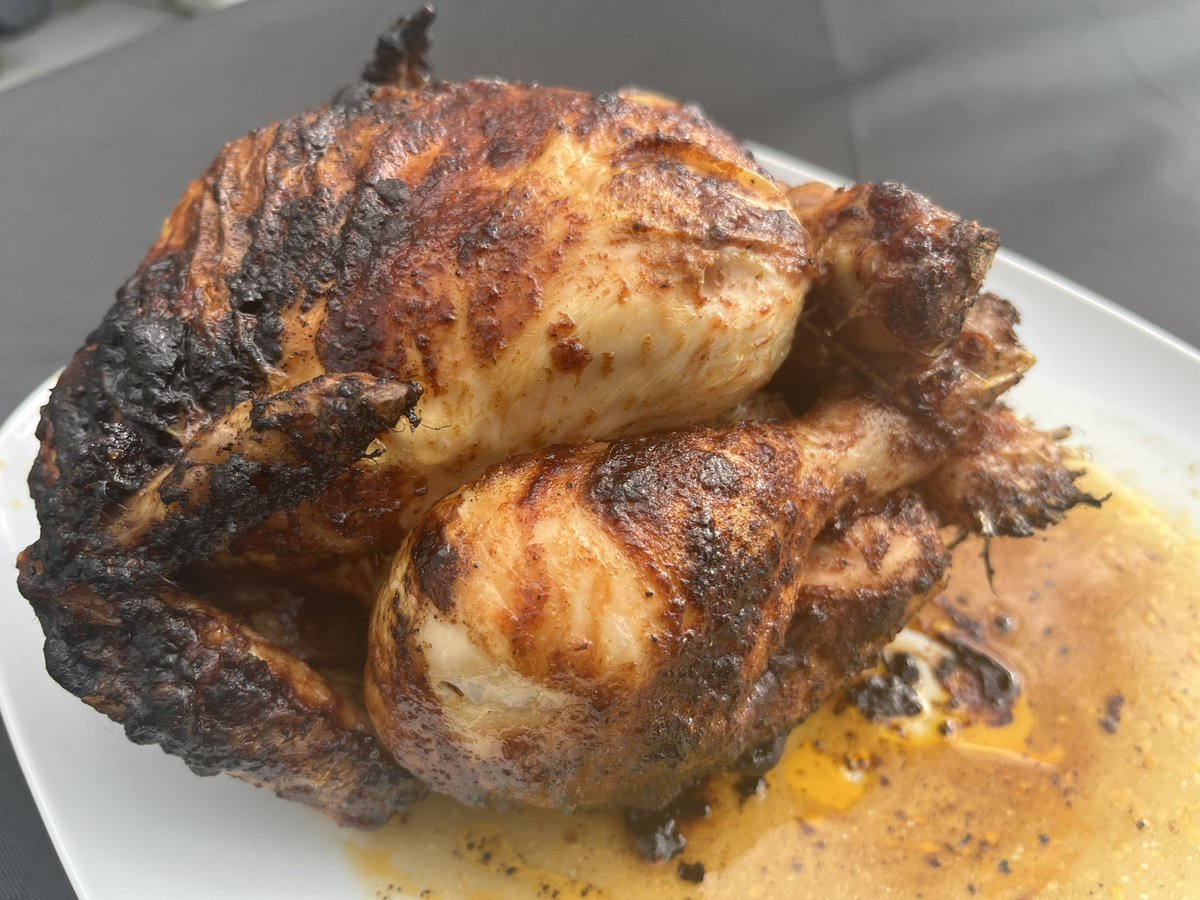 Rotisserie chicken cooked on the Weber BBQ over charcoal rubbed with Traeger Pork and Poultry Apple and Honey.