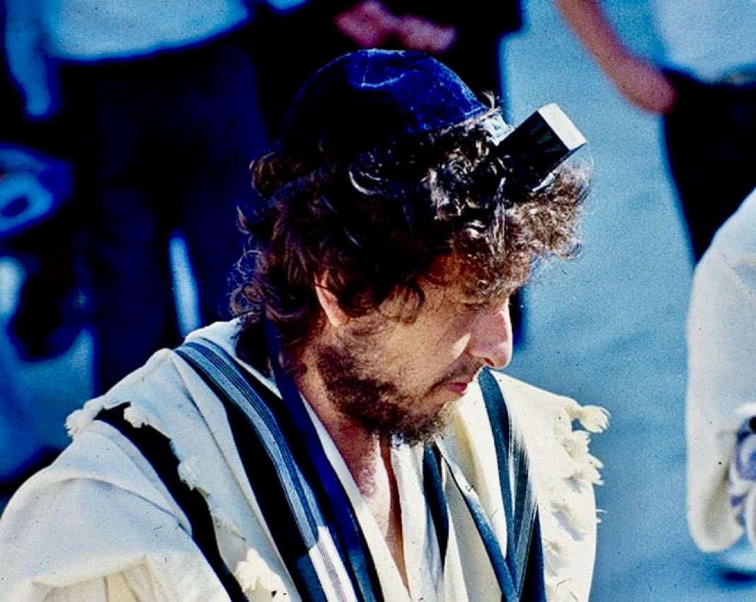 While “Bob Vylan” hijacks Bob Dylan’s name to incite violence against Israelis…

Here’s the real Bob Dylan — standing at the Western Wall, celebrating his son’s Bar Mitzvah in Jerusalem, the eternal capital of the Jewish people. 🇮🇱✡️