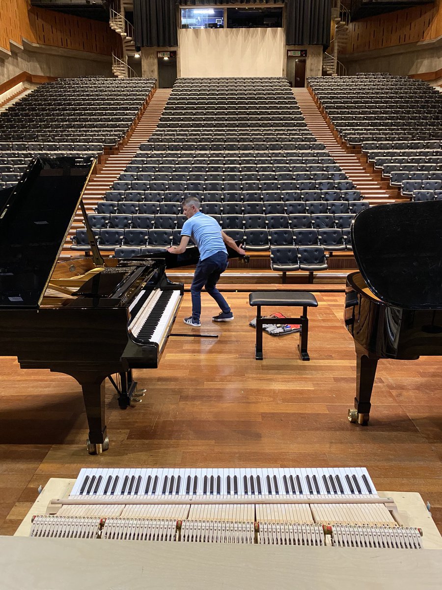 juliusdrake's tweet photo. So good to be back at the #QEH in London for a concert with the charismatic pair #rubyhughes and @natalieclein Pictures include changing the action on the piano - the @southbankcentre offer a choice - and the fabulous leather seats that I’ve loved since I was a child. #TreVoce https://t.co/JRYcDso0lu
