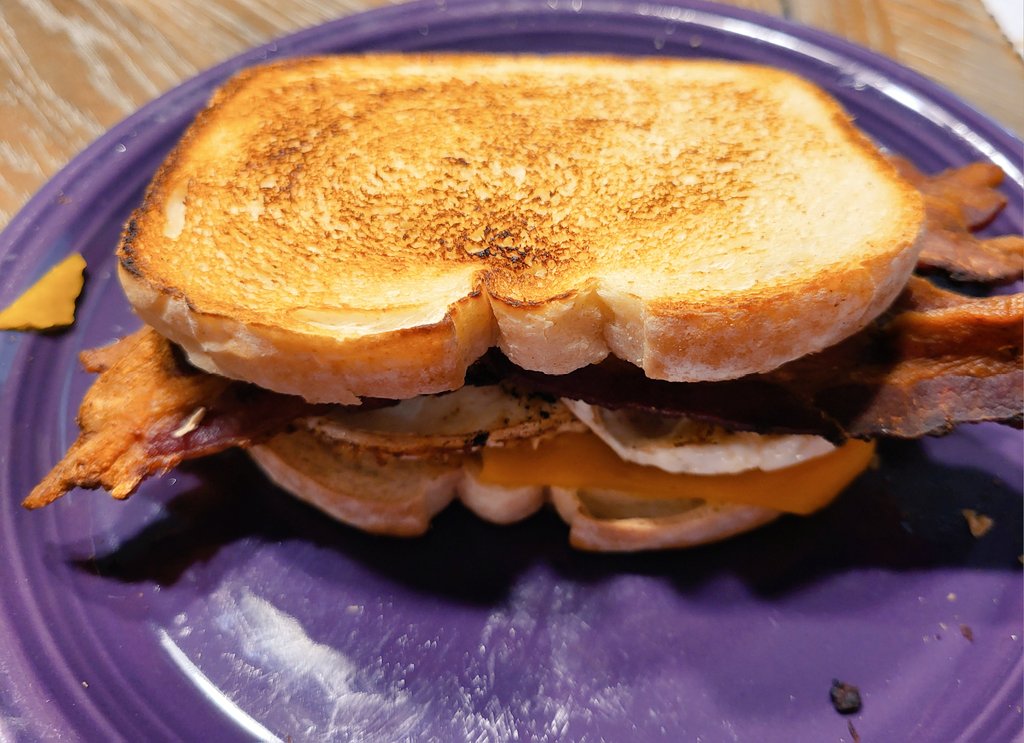 Had some bacon in the freezer that was gettin' a little age on it .... "breakfast" off of the flat top grill for dinner tonight.