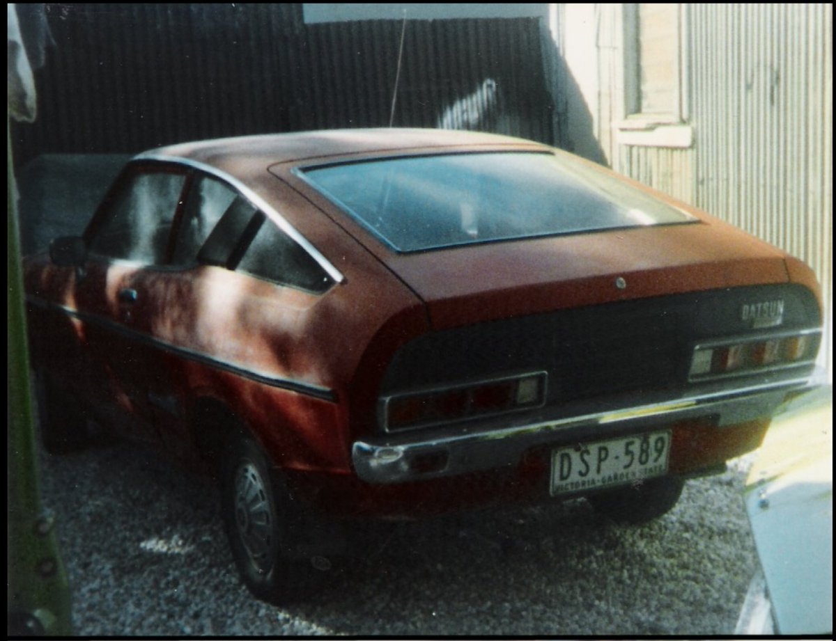 Going through an old family photo album, and on a car my father owned, I noticed the rego plates.