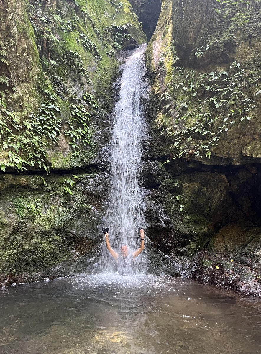 How to deal with summer heat: find a waterfall and get under it.