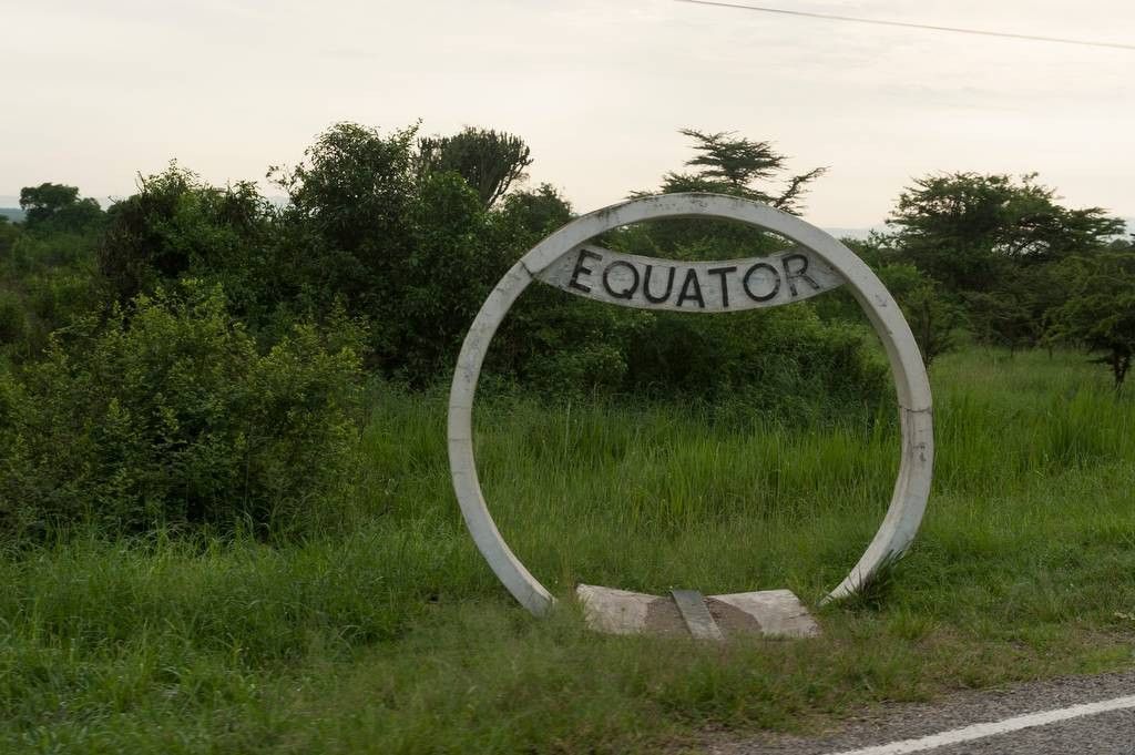 Stand in two hemispheres at once! Perfect photo opportunity awaits. Create unique memories now: queenelizabethnationalparkuganda.com #queenelizabethnationalparkkaseseuganda #queenelizabethparkiuganda #queenelizabethnationalparksafari