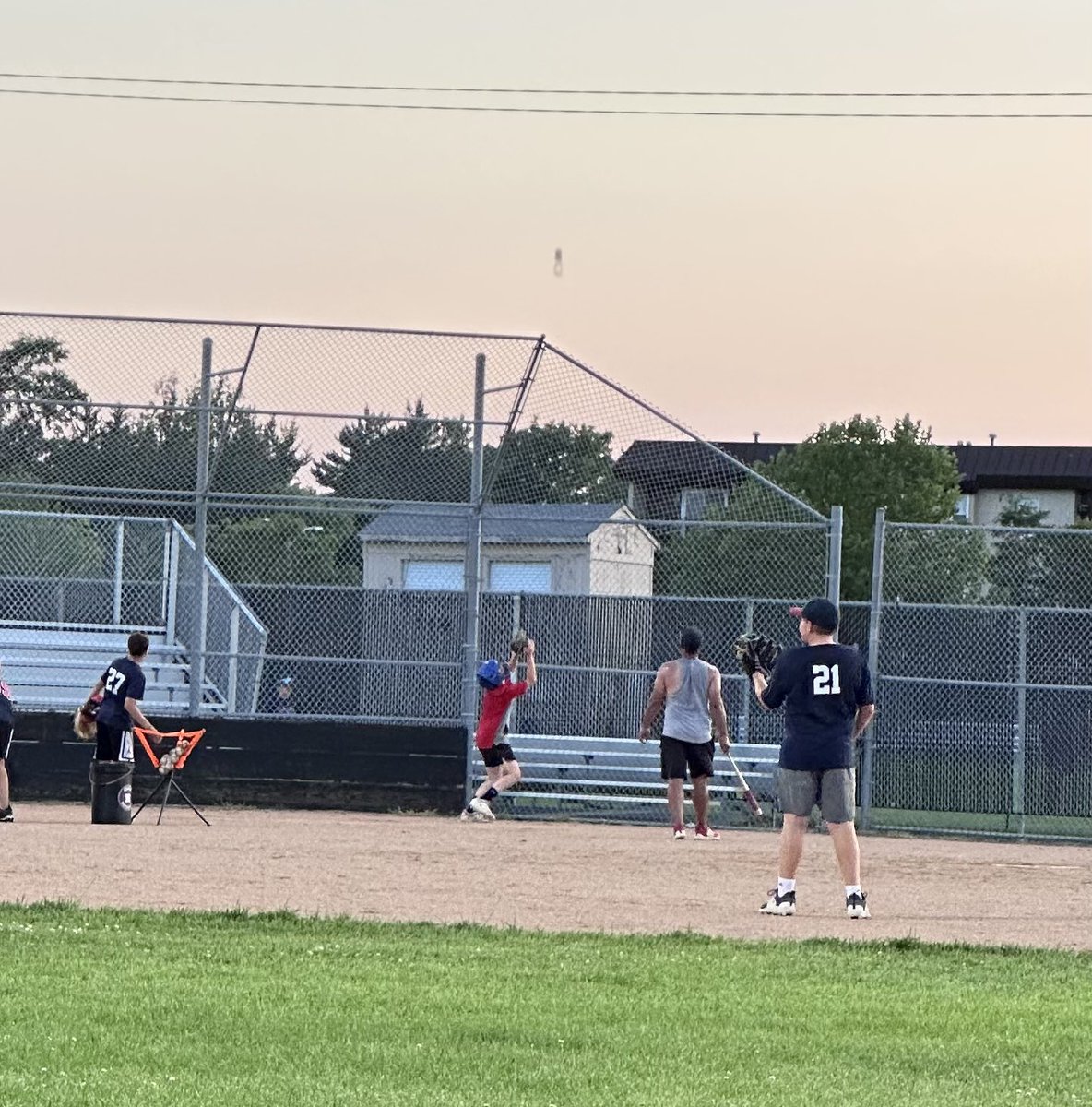 OmahaNats2031's tweet photo. Coach Fisch is a pro at a lot of drills, but he’ll admit pop-ups to the catcher are still a work in progress. 😉 We think he did better than average today—only a few balls went out of play! ⚾️ Practice makes perfect! #OmahaNats #YouthBaseball #PracticePaysOff https://t.co/fZXGNYQlIp