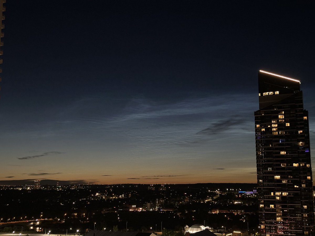 adolwyn's tweet image. Cell phone photo but looks like the first noctilucents of the year up there. #yyc